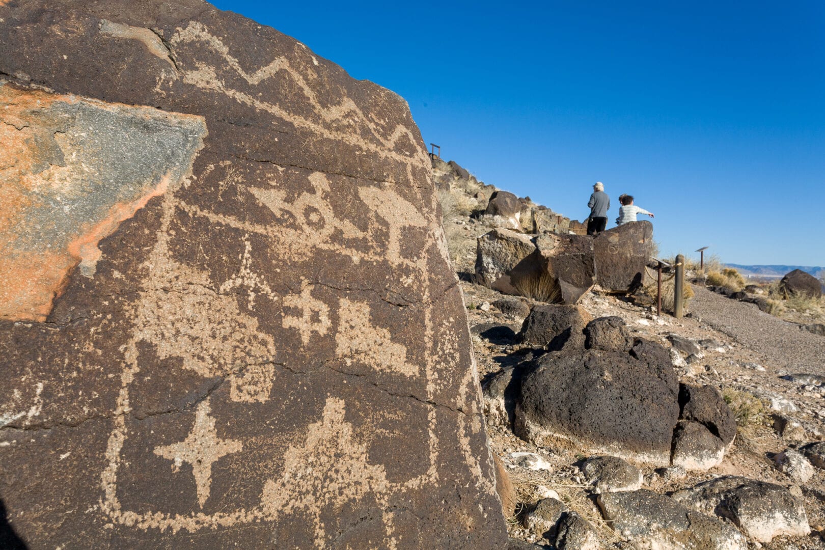 Petroglyph National Monument is located on the volcanic escarpment west of Albuquerque. It contains over 20,000 petroglyphs carved by American Indians and Spanish Settlers 400-700 years ago